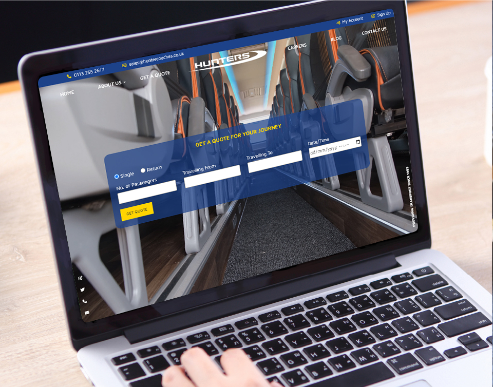 Hunters Coaches – website shown on laptop